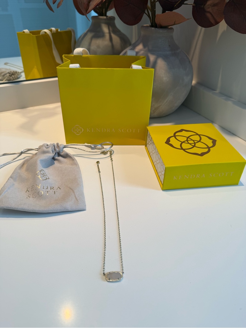 Kendra Scott Gold Oval Pendant Necklace with Light Pink White Stone